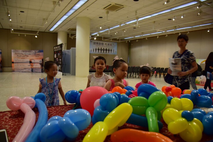 Kids are attracted by the balloon!  They have to say “Treasure our Life” before getting a balloon from us