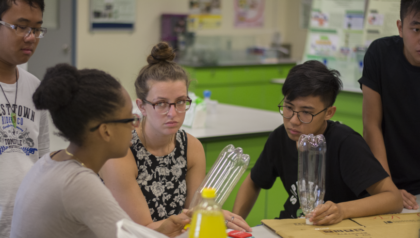 MIT students and THEi students were discussing how to make the best water rocket  